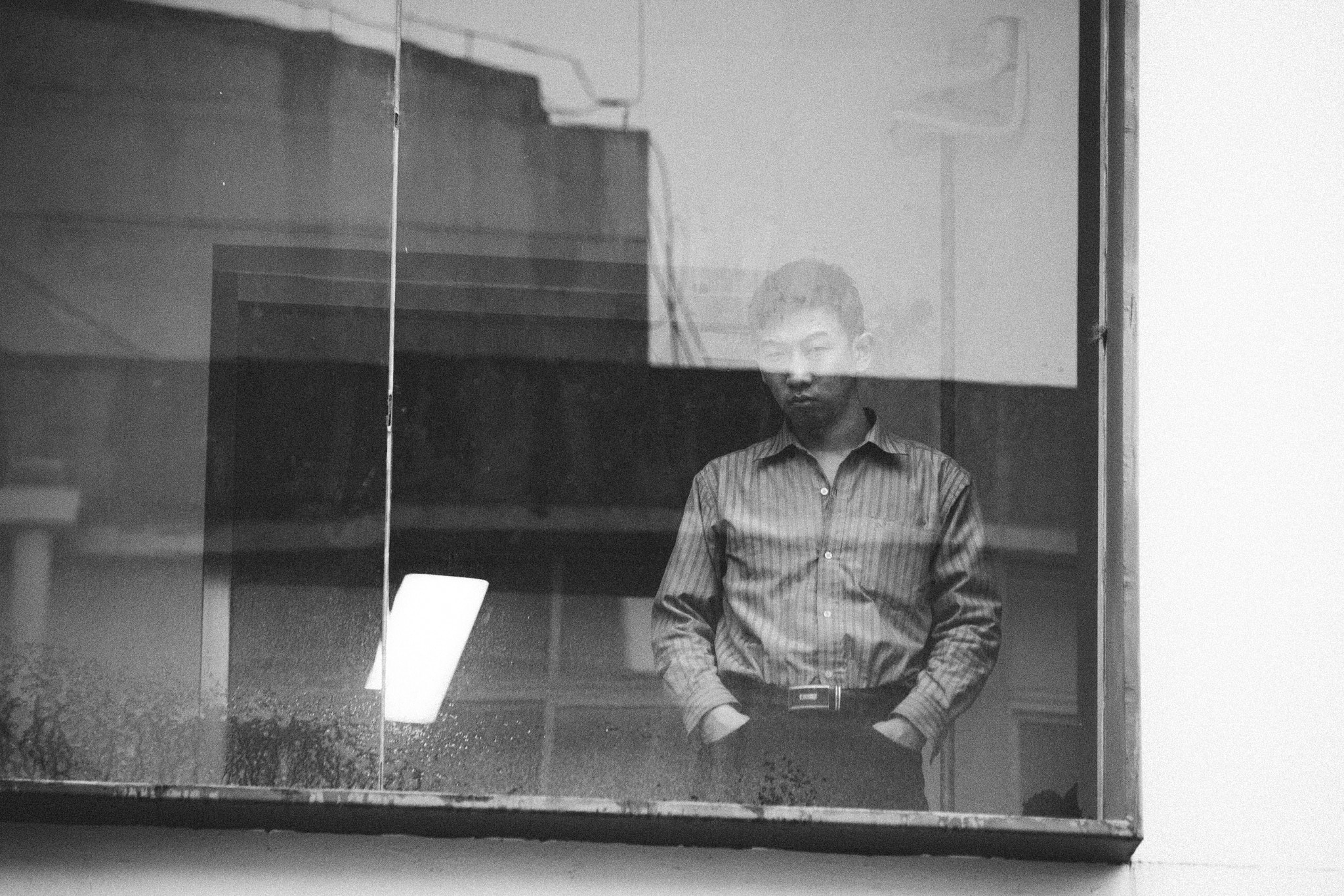 Canon EF-S 55-250mm F4-5.6 IS STM sample photo. Man watching at me photography