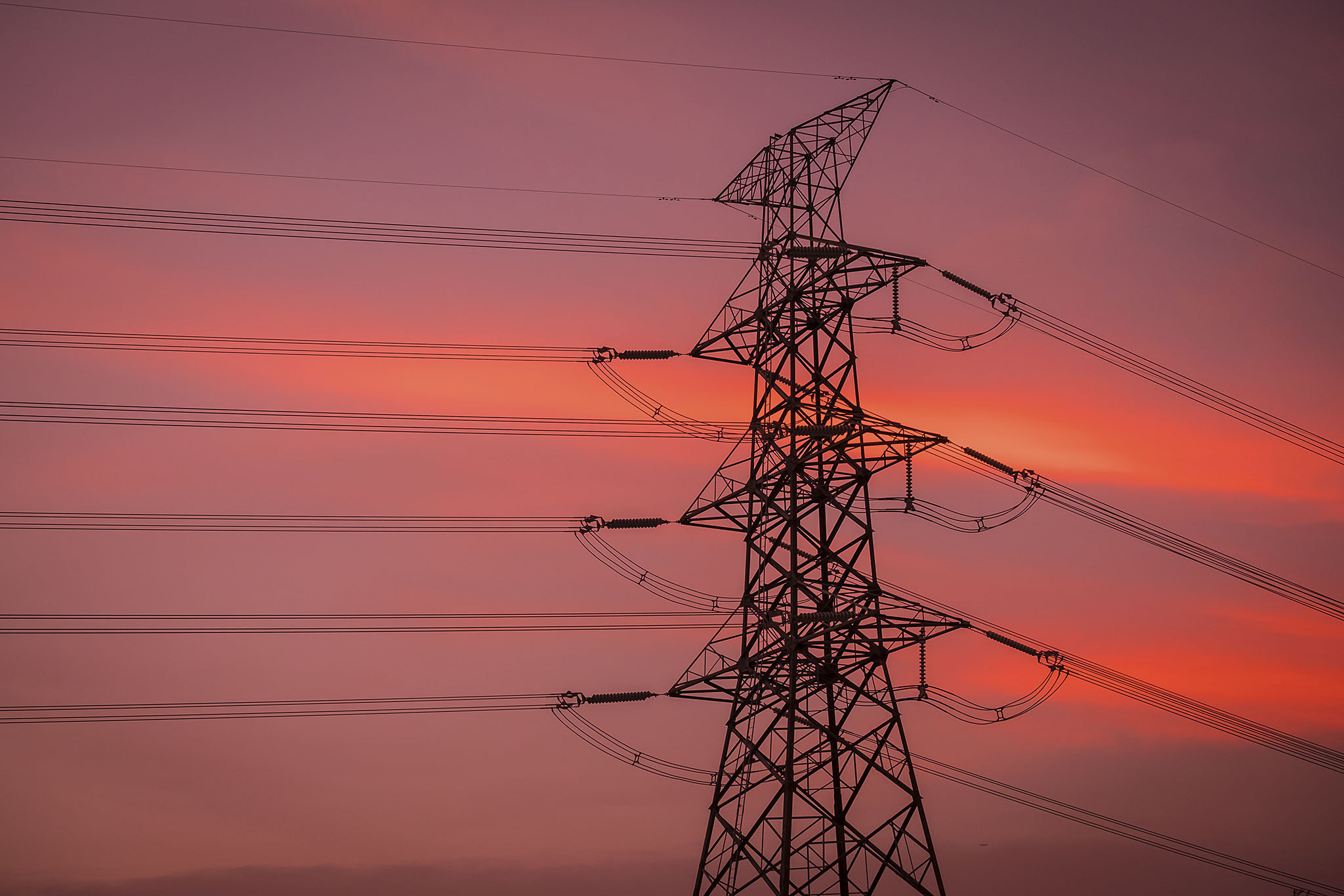 Fujifilm X-T20 + Fujifilm XC 50-230mm F4.5-6.7 OIS II sample photo. Sunset under the high-voltage tower in the background photography