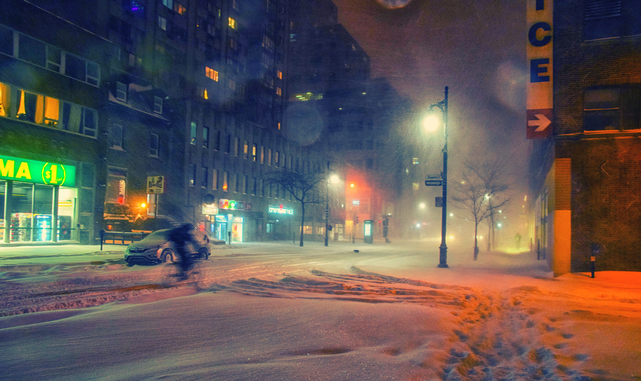 Sigma 17-50mm F2.8 EX DC OS HSM sample photo. Cyclist in blizzard photography