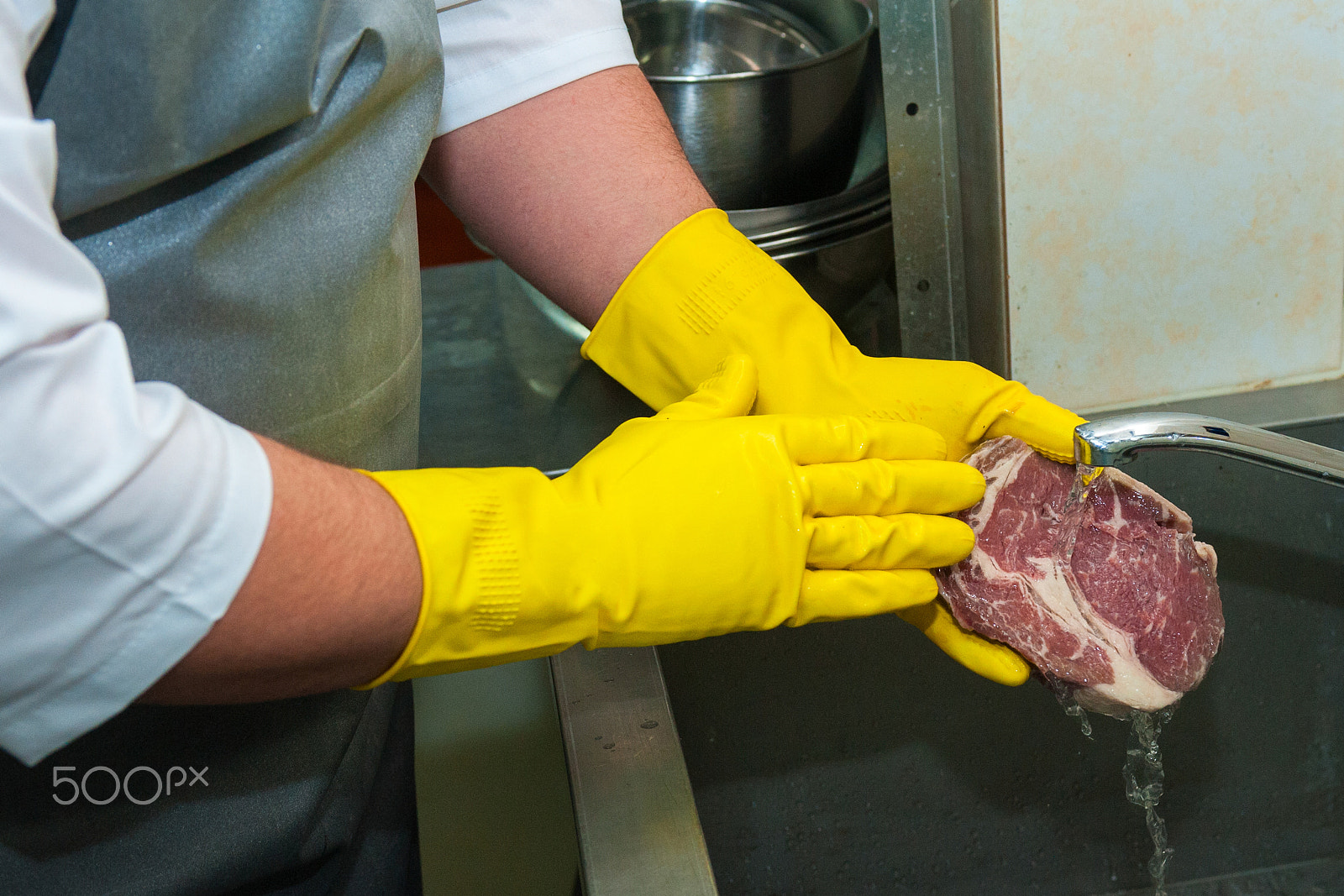 Nikon D700 sample photo. Washing and cleaning meat photography