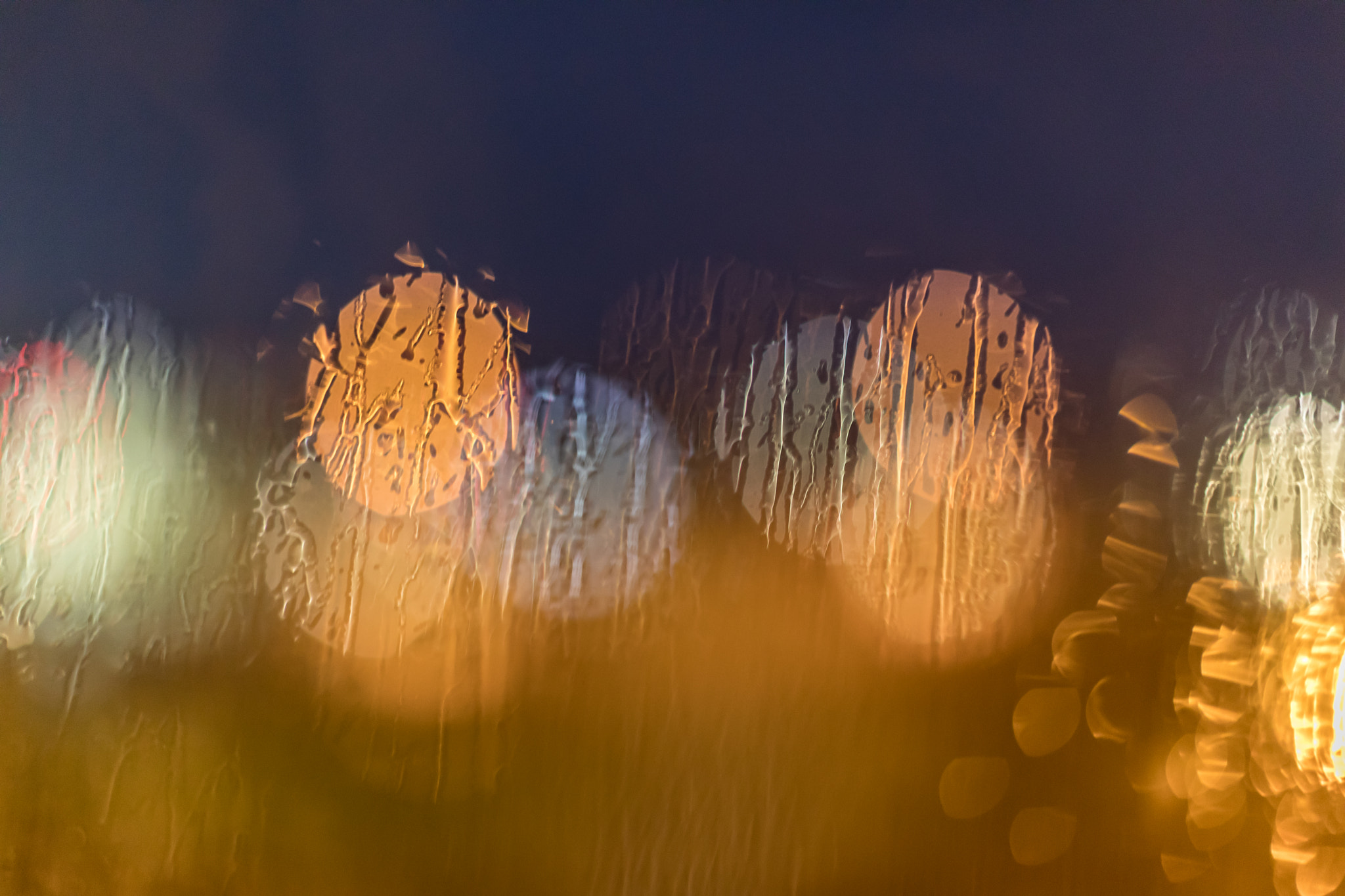 Canon EF 50mm F1.2L USM sample photo. Rain on window photography