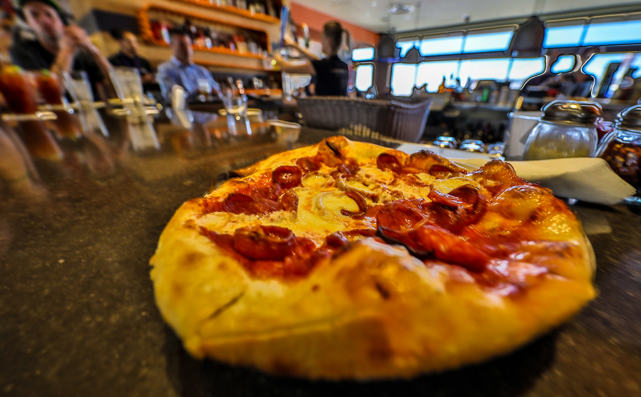 Canon EF 11-24mm F4L USM sample photo. Airport pizza photography