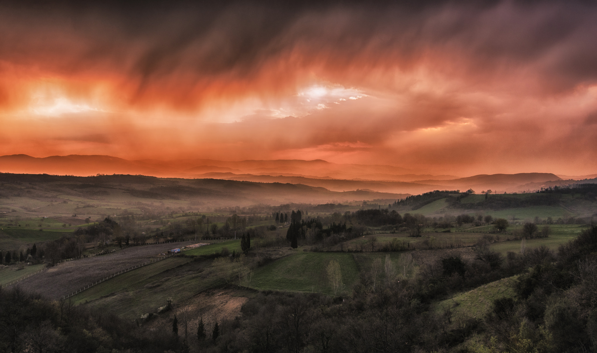 Tamron AF 19-35mm f/3.5-4.5 (A10) sample photo. Sun...behind the clouds shining over the lowland. photography