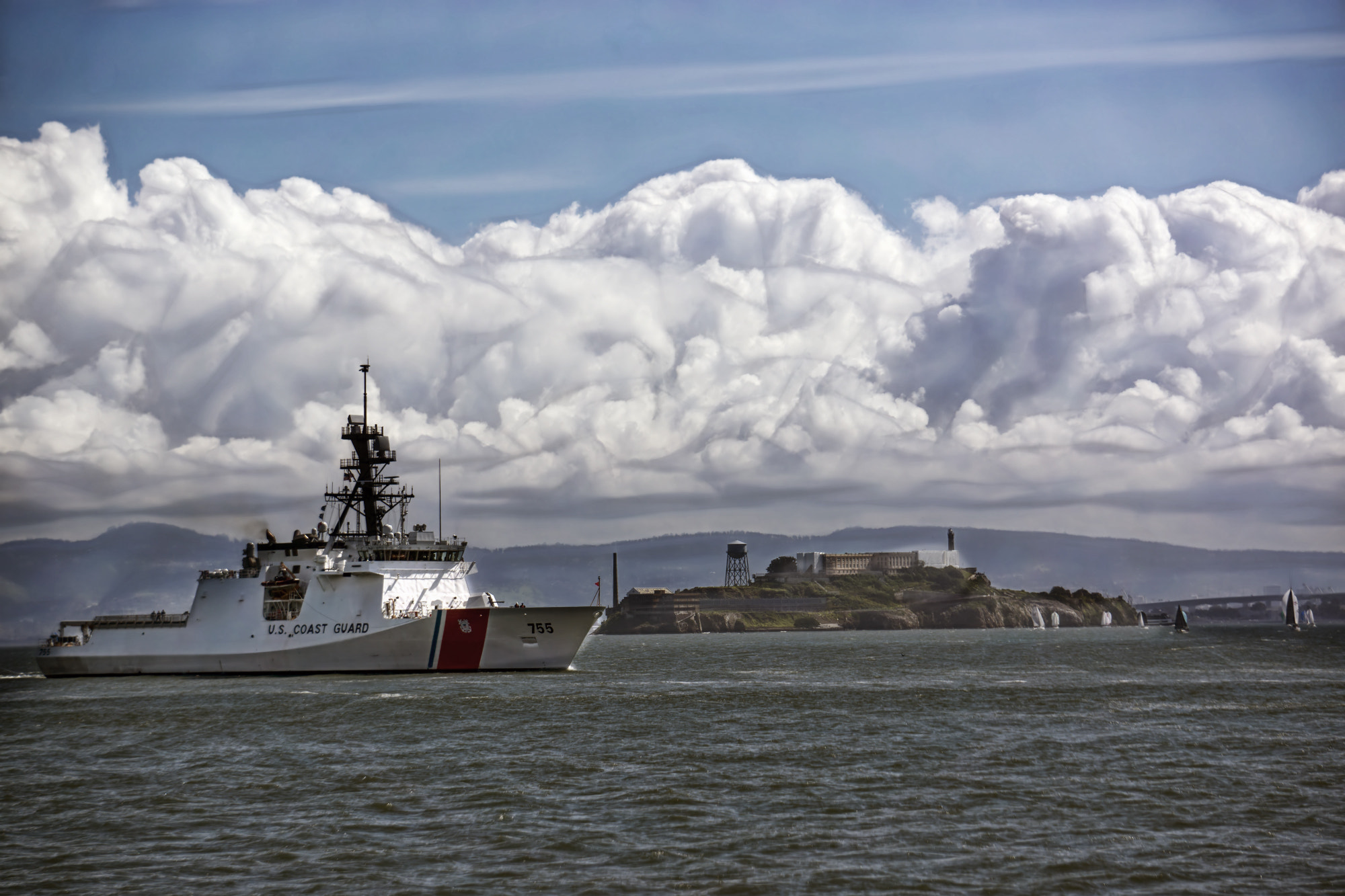 Sony Alpha NEX-7 + Sony E 55-210mm F4.5-6.3 OSS sample photo. Coast guard and clouds photography