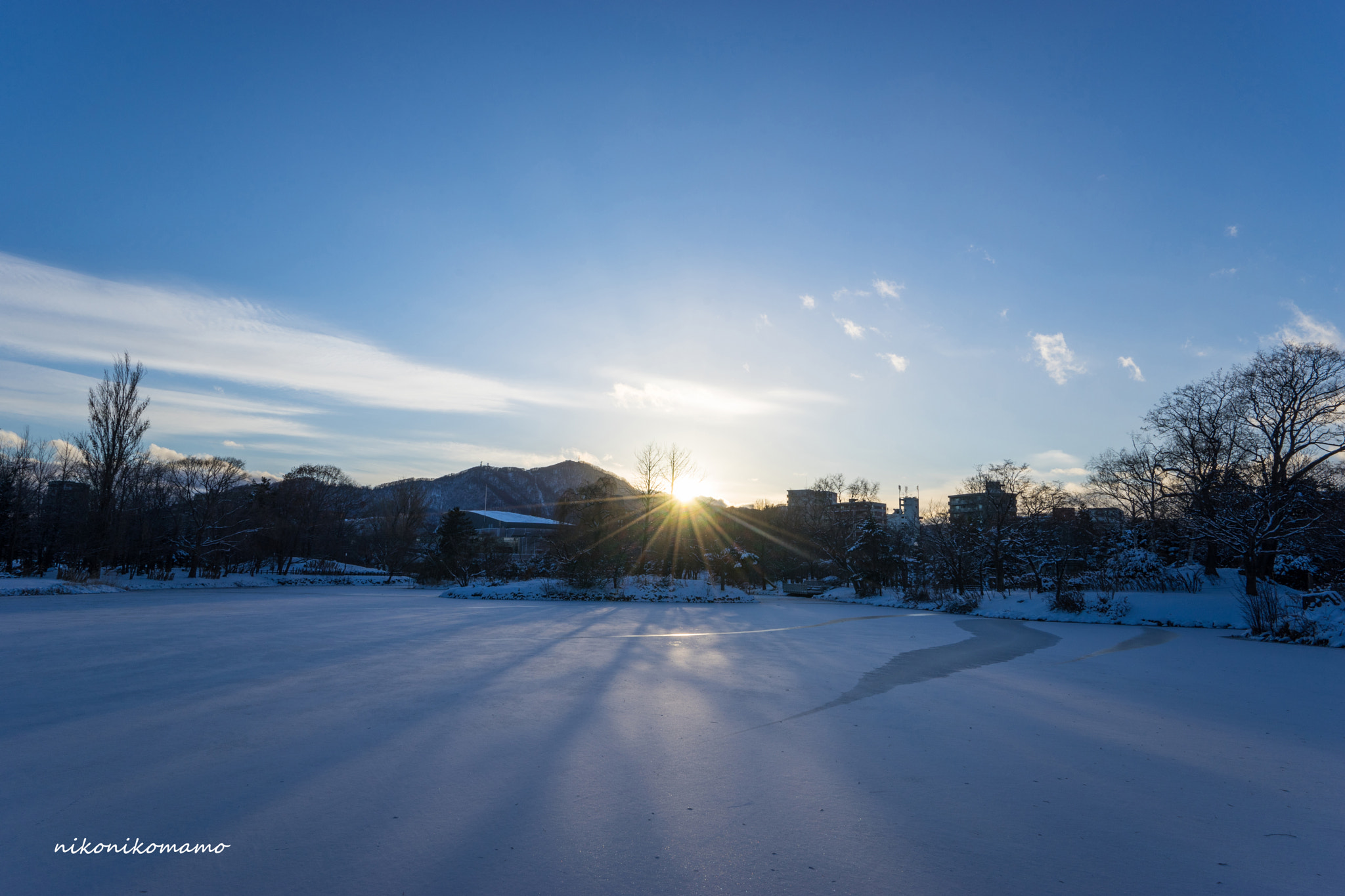 Sony a7 + Sony Vario-Tessar T* FE 16-35mm F4 ZA OSS sample photo. Frozen pond and sunset. photography