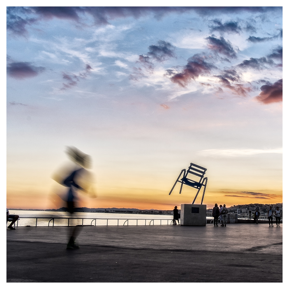 Fujifilm X-Pro1 sample photo. Jogger on nice's promenade. photography