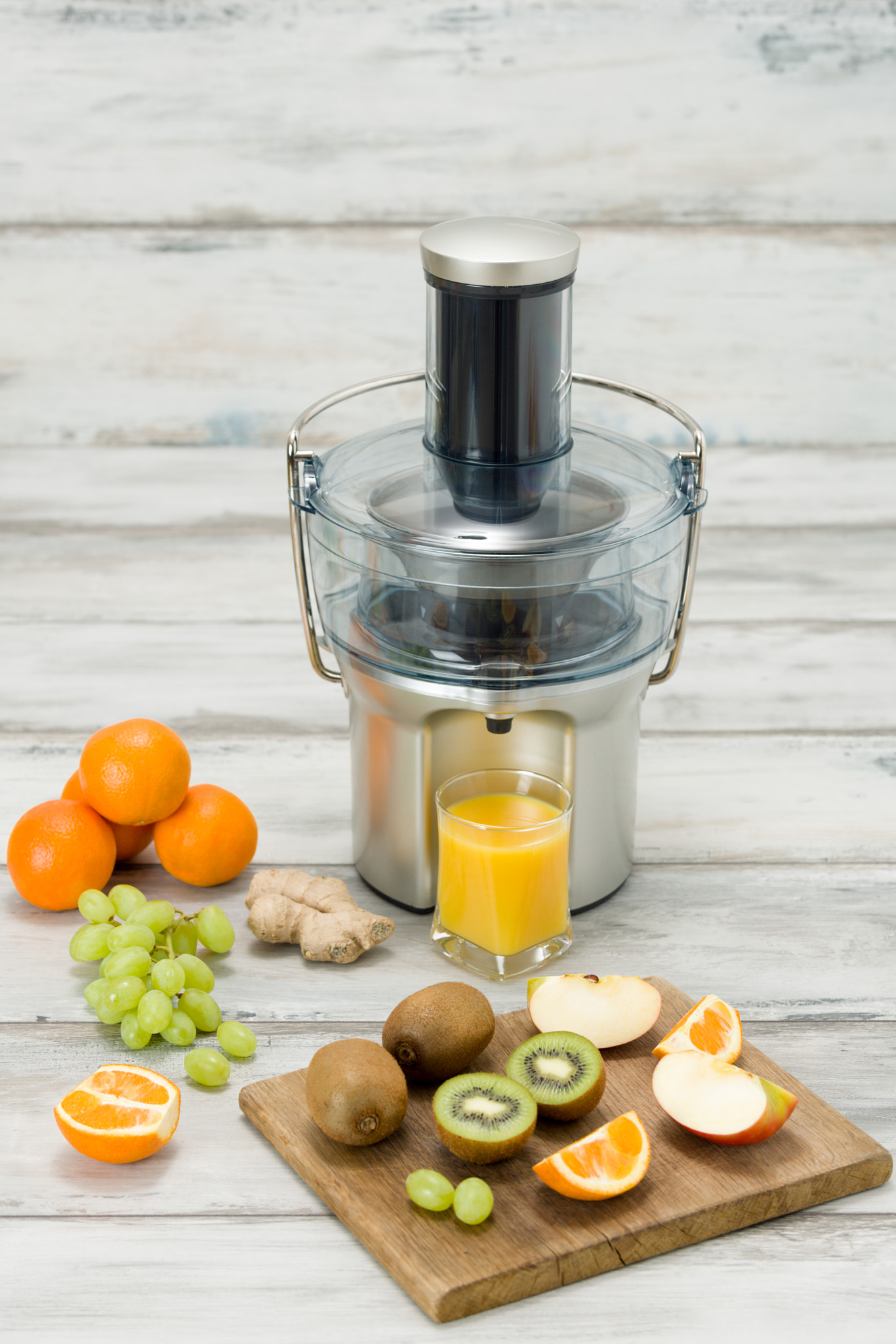 Nikon D810 sample photo. Modern electric juicer, various fruit and glass of freshly made juice, healthy lifestyle concept photography