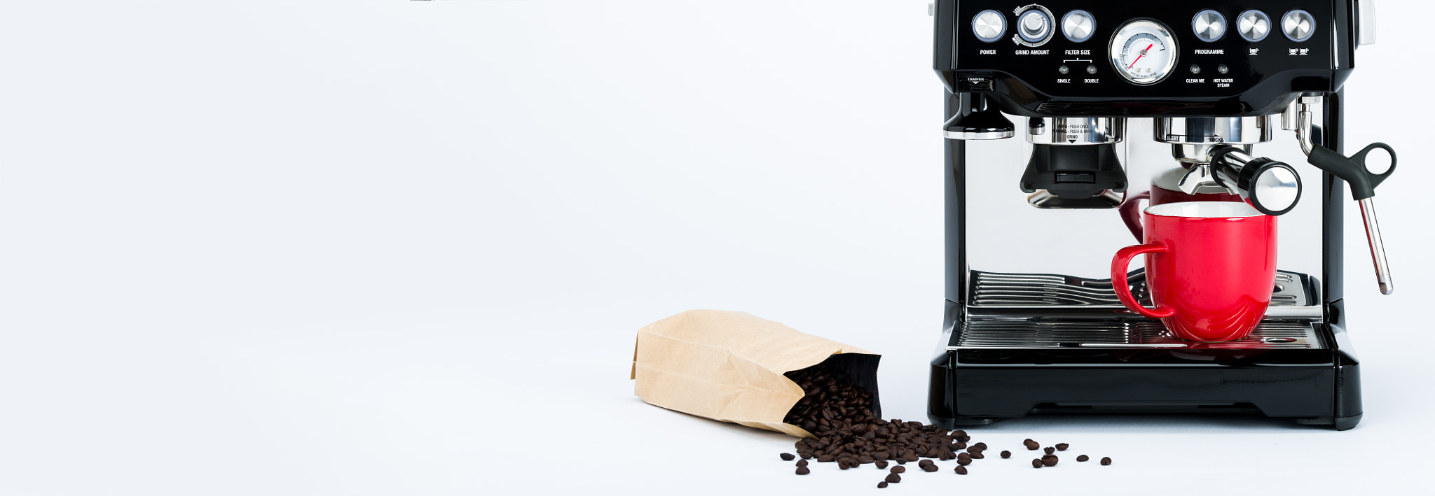 Nikon D810 sample photo. Banner with isolated black manual coffee maker with grinder and red coffee mug and bag of freshly... photography
