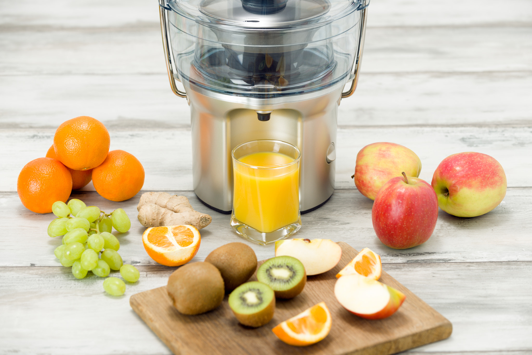 Nikon D810 sample photo. Modern electric juicer, various fruit and glass of freshly made juice, healthy lifestyle concept photography
