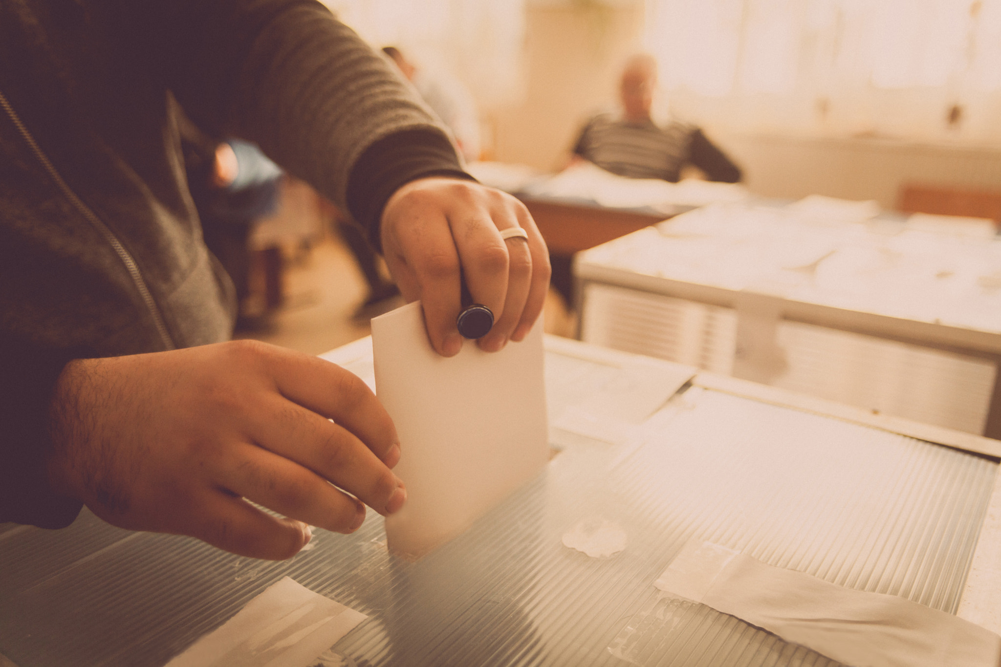 Canon EOS 5D Mark II sample photo. Person voting at polling station photography