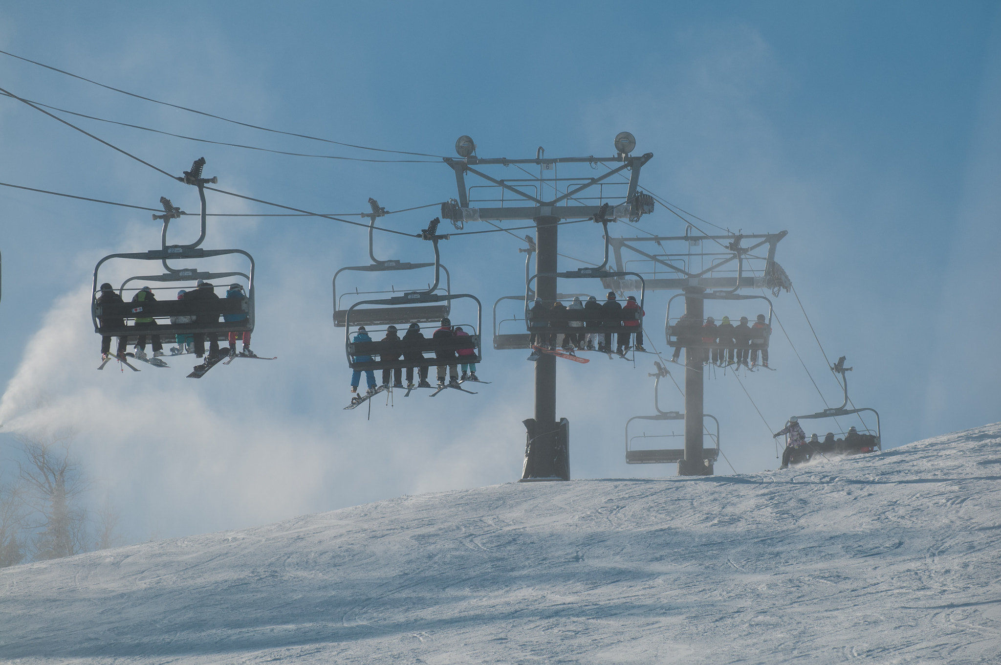 Nikon D300 sample photo. Skiers on a chair lift photography