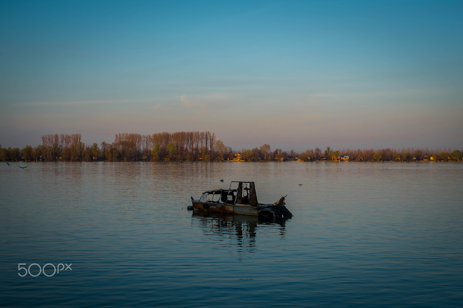Fujifilm X-Pro1 + Fujifilm XF 35mm F1.4 R sample photo. Boat wreck on the river landscape photography