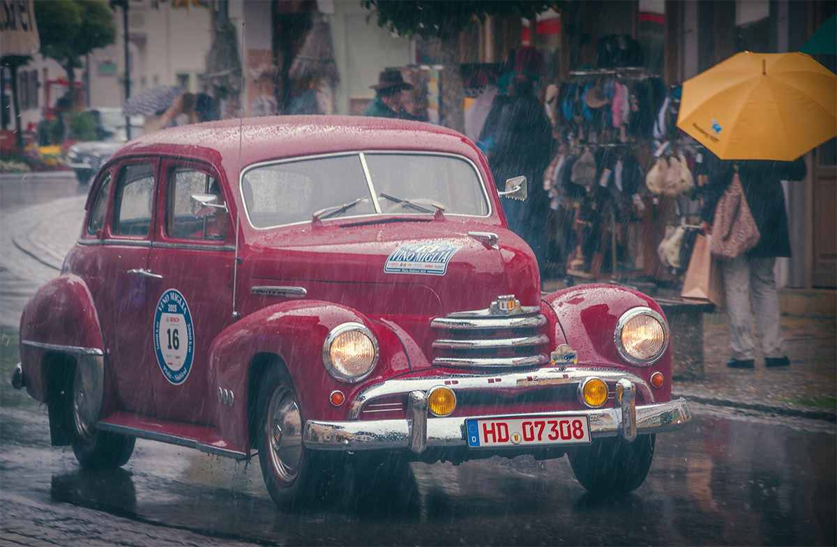 Sigma 18-200mm f/3.5-6.3 DC OS sample photo. Opel in rain photography