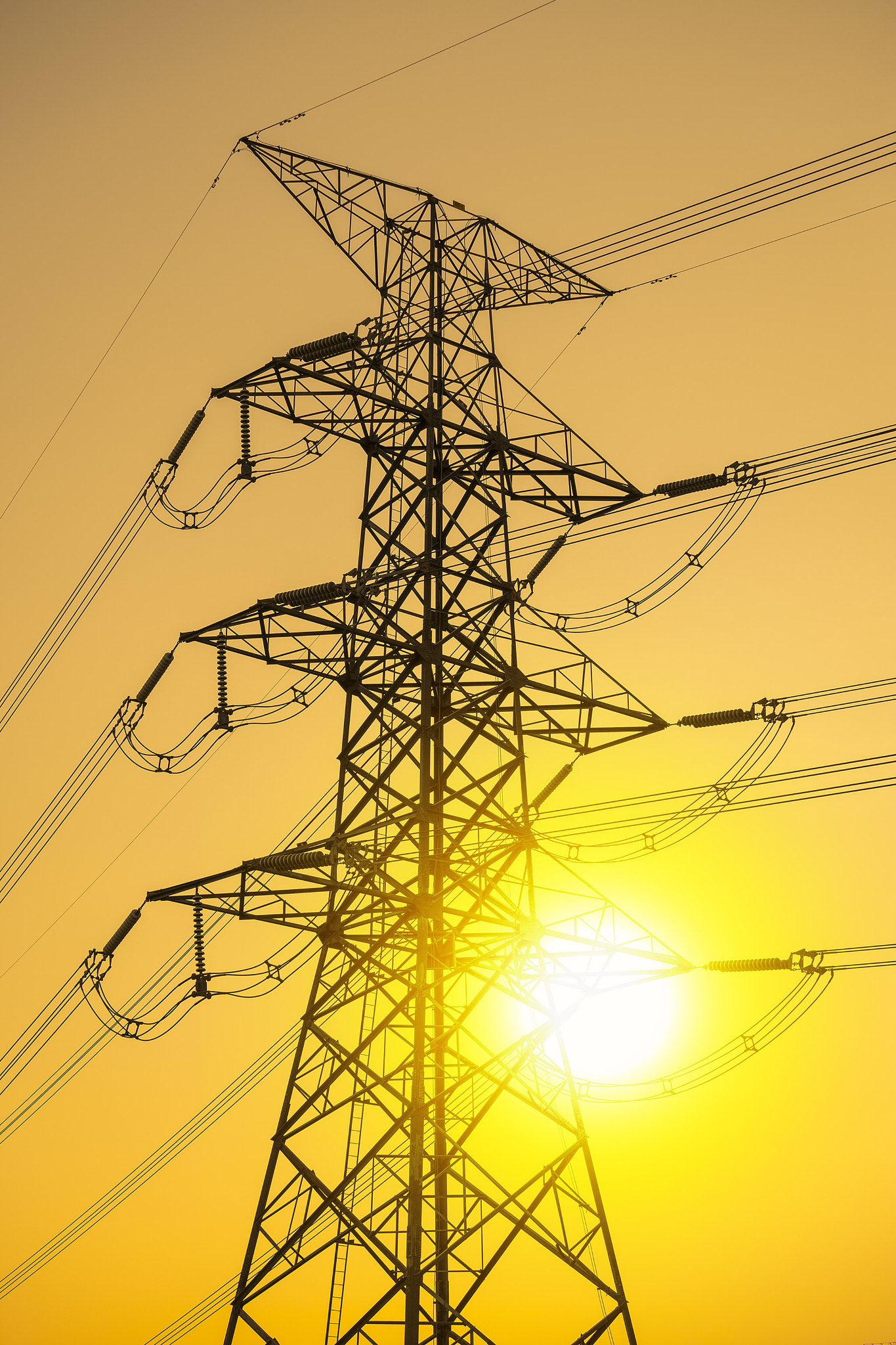 Fujifilm X-T20 + Fujifilm XC 50-230mm F4.5-6.7 OIS II sample photo. Electricity pylons and lines at sunset photography