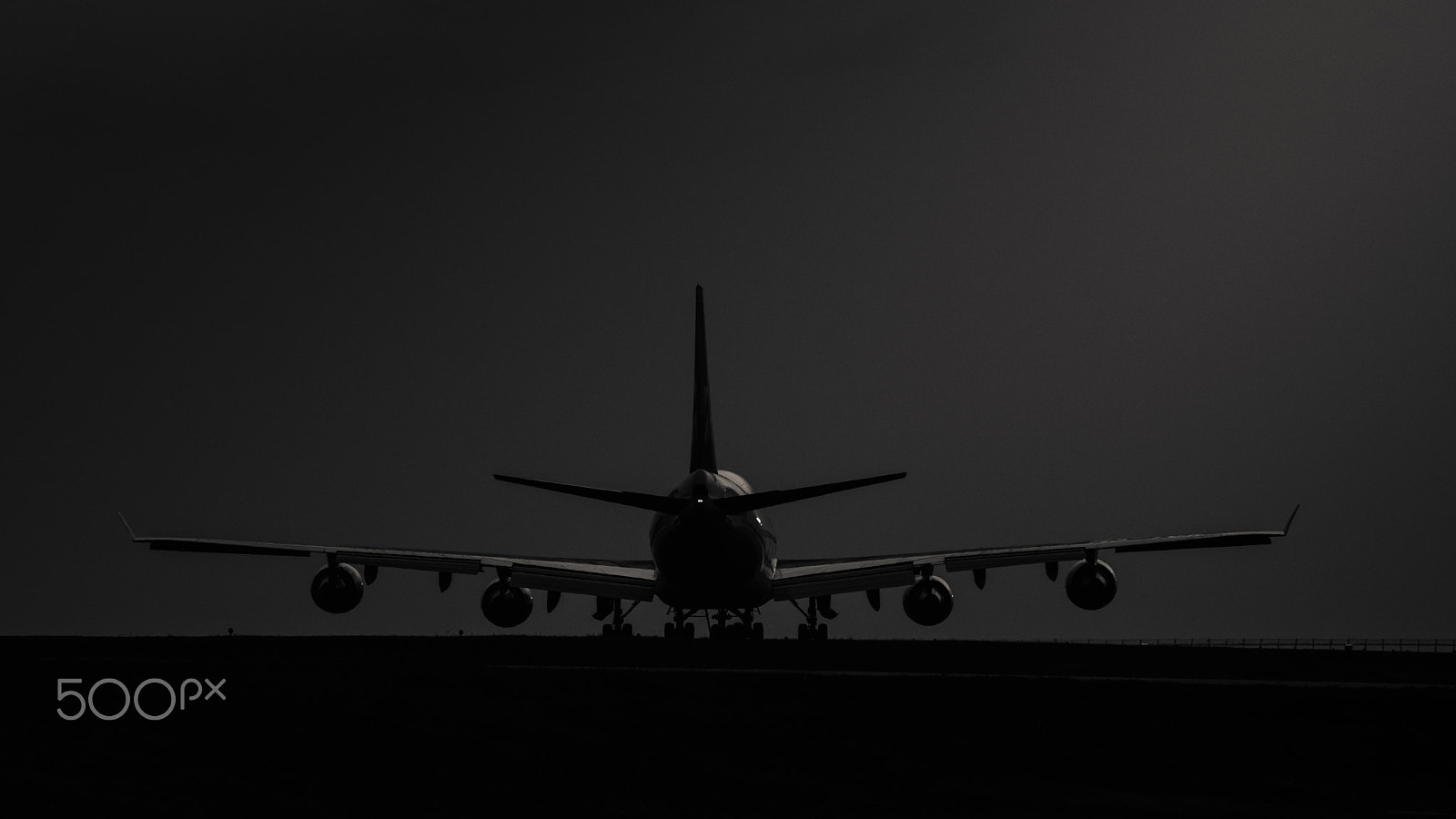 Nikon D500 sample photo. Rear view of airplane in black and white photography
