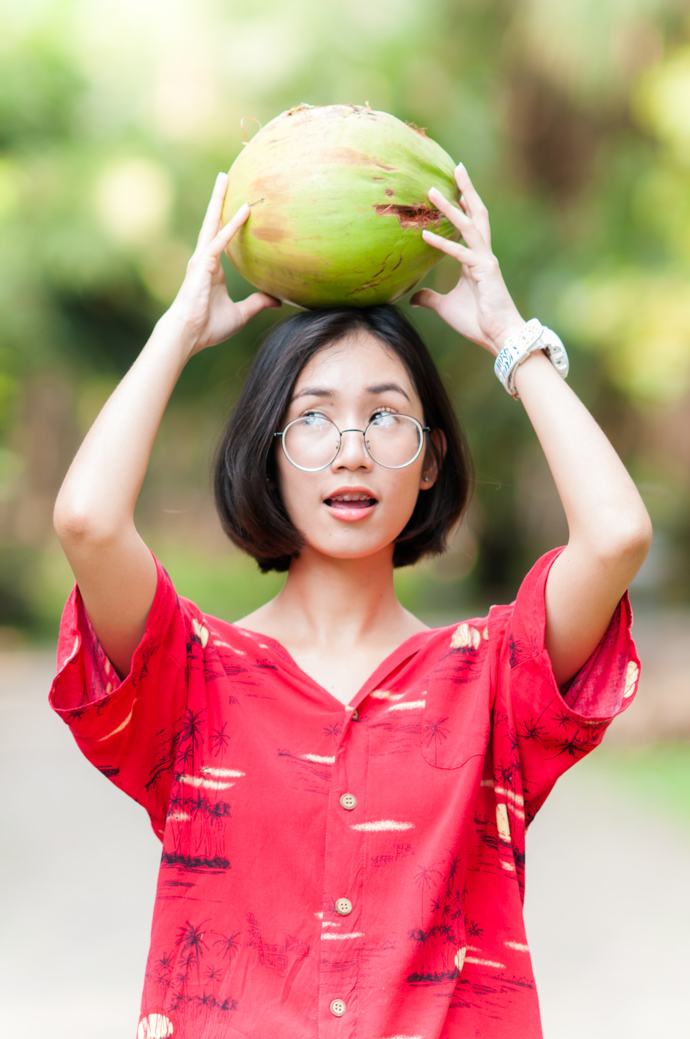 Nikon D300 + AF DC-Nikkor 135mm f/2D sample photo. Portrait asian woman with coconut in the park. photography