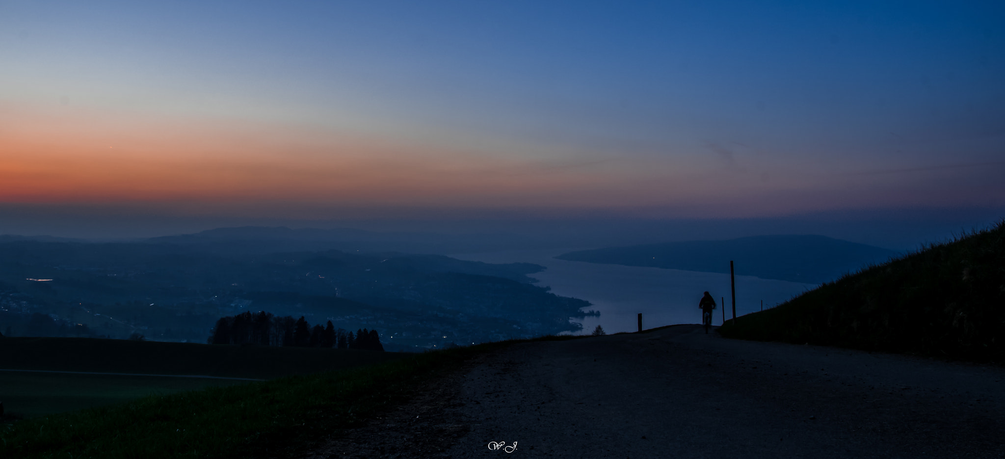 Sony ILCA-77M2 sample photo. Cyclist over lake zurich photography