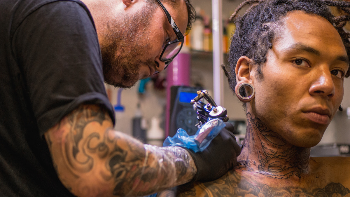 Panasonic Lumix G 42.5mm F1.7 ASPH Power OIS sample photo. Tattoo shop photography