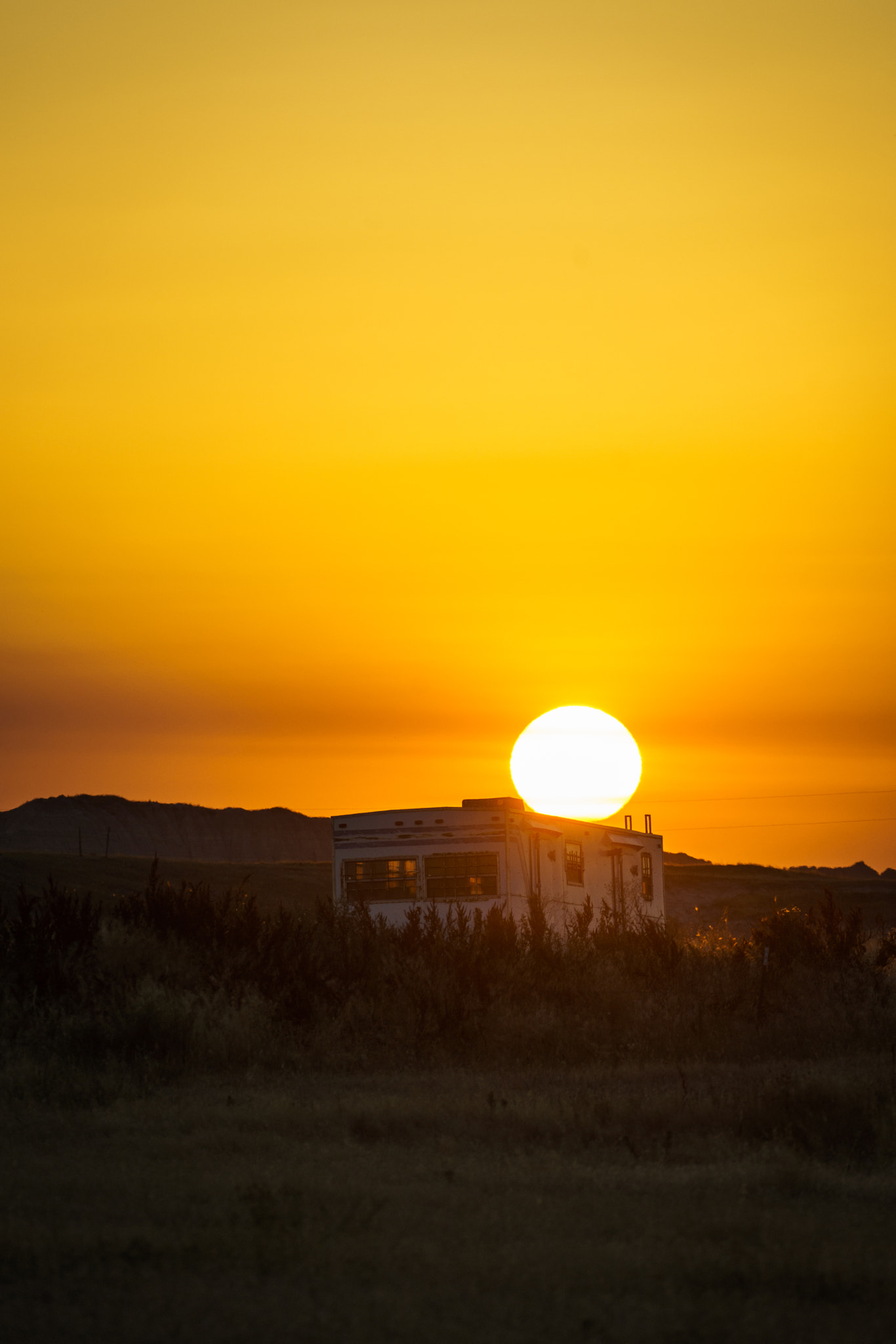 Sony a7R II + Sony FE 70-300mm F4.5-5.6 G OSS sample photo. Badlands sunset photography