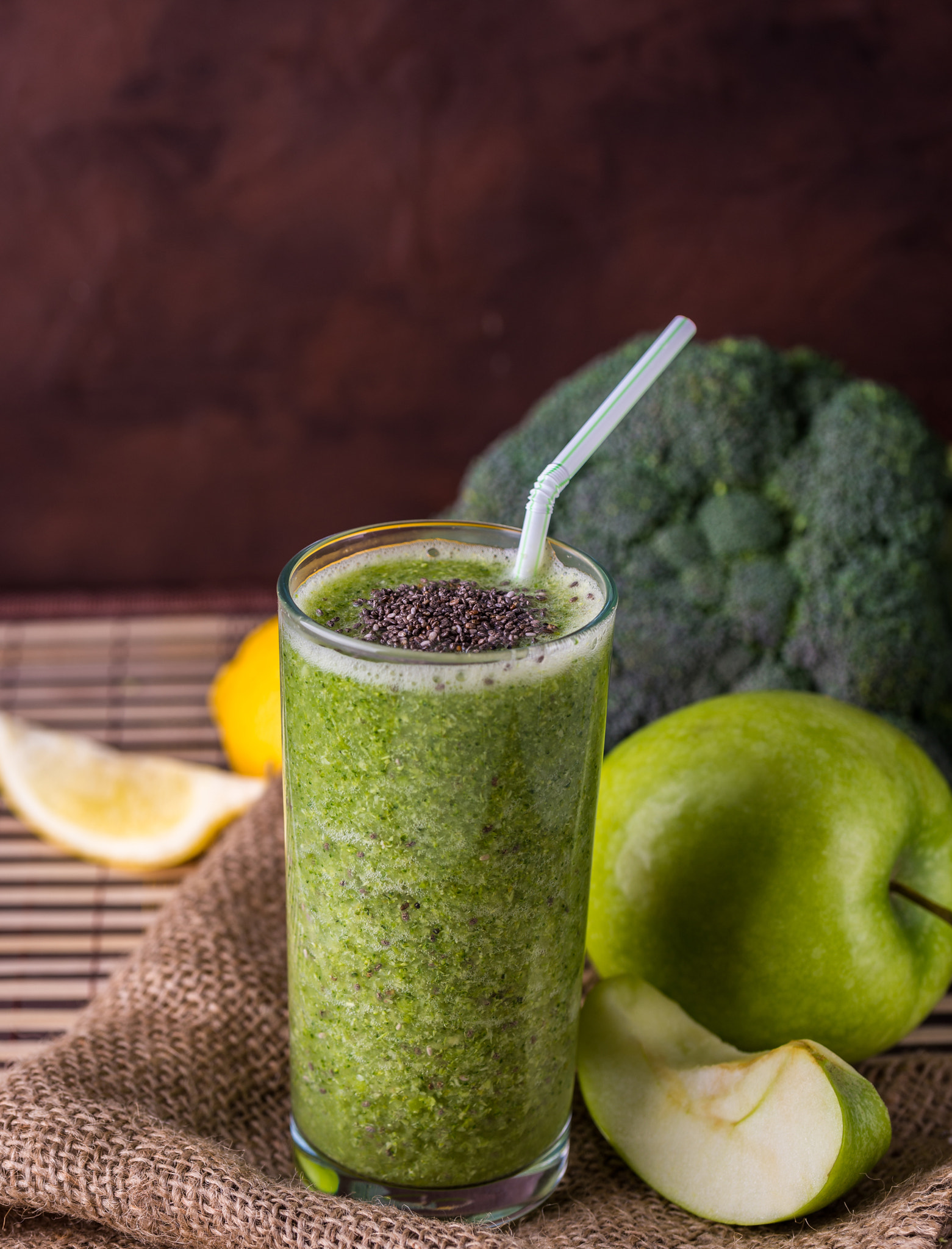 Nikon D610 + Tamron SP 90mm F2.8 Di VC USD 1:1 Macro (F004) sample photo. Broccoli smoothie in glass bowl on wooden background with lemon photography