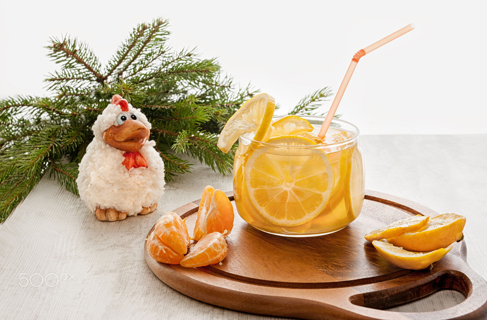 Nikon D700 sample photo. On a wooden background with drink in clear glass cup with slices of oranges and lemons with the... photography