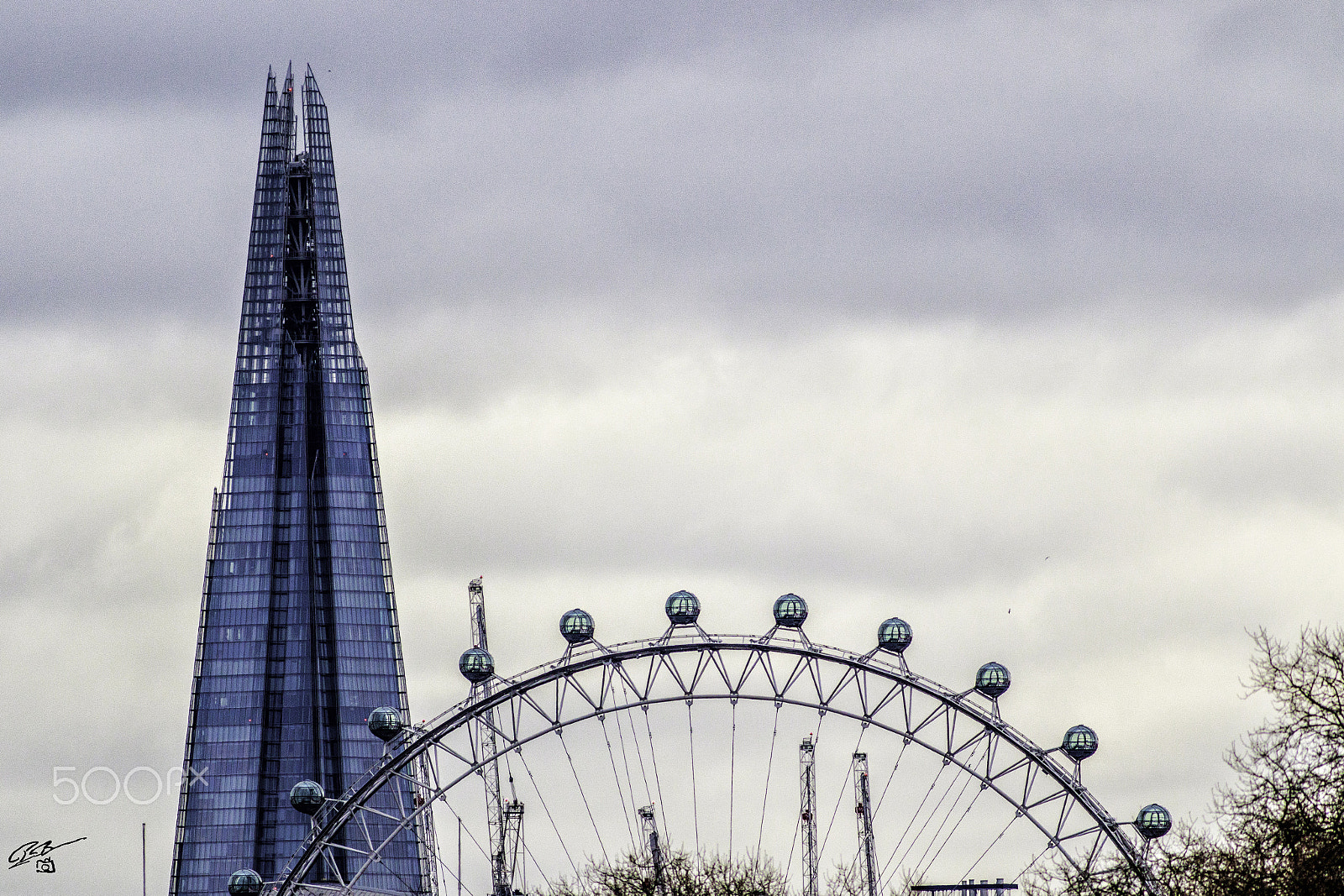 Canon EOS 7D Mark II + Canon EF 400mm F5.6L USM sample photo. Shard and wheel colour photography