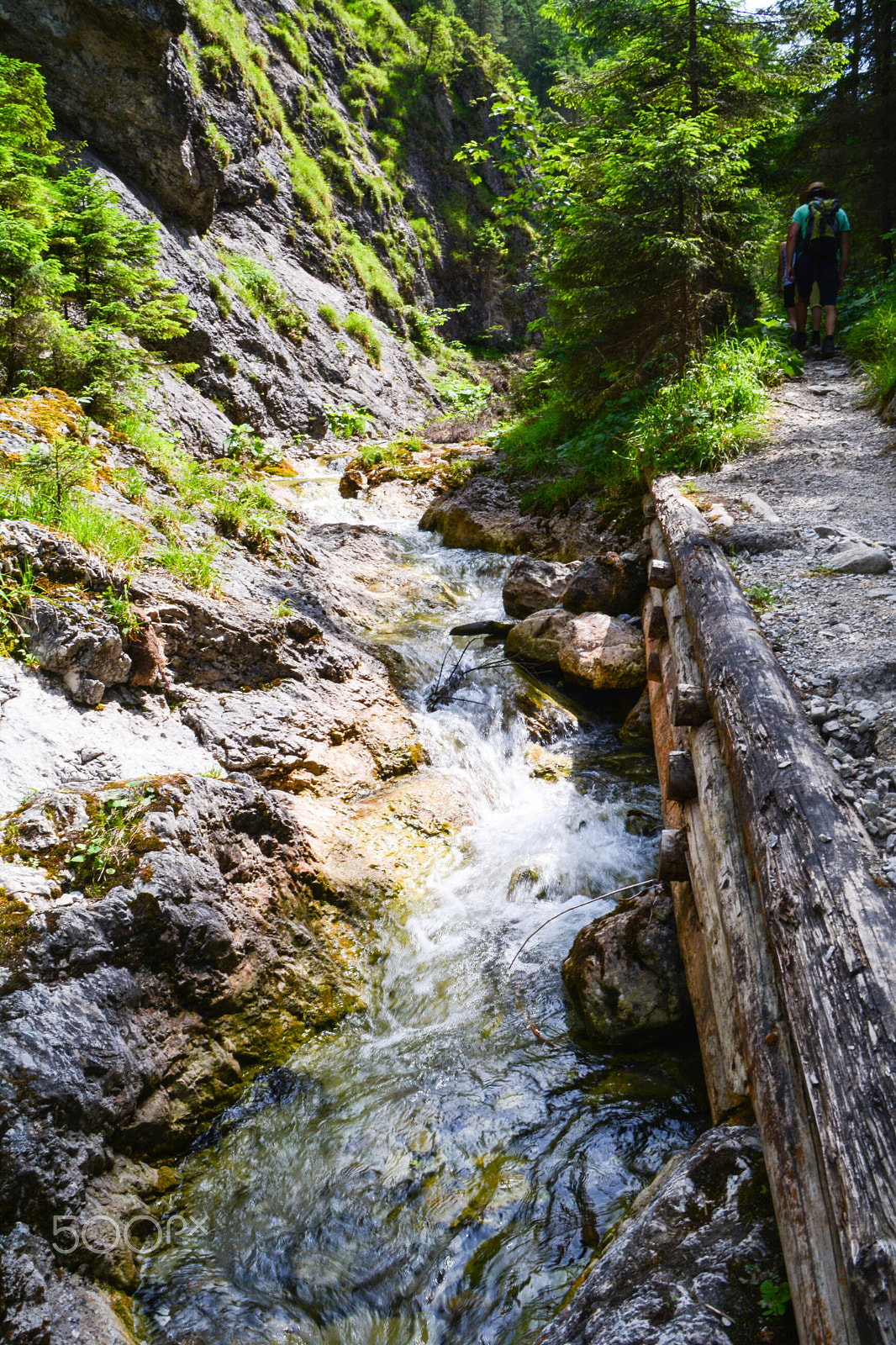 Nikon D5200 sample photo. Mountain streams with sidewalks and the people photography