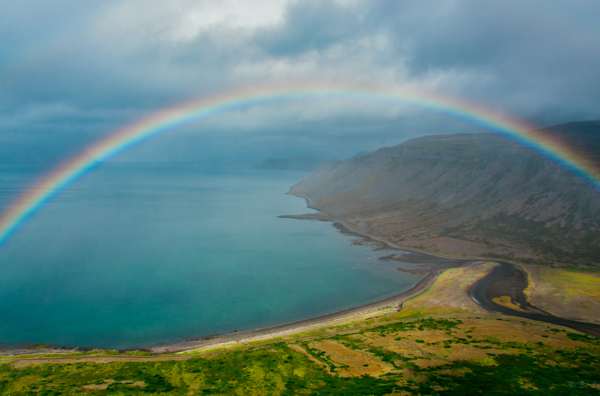 Nikon D600 + Nikon AF-S Nikkor 28-300mm F3.5-5.6G ED VR sample photo. Rainbow over fjord in iceland photography
