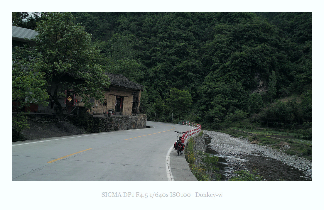 Sigma DP1 sample photo. Cycling in the mountains photography