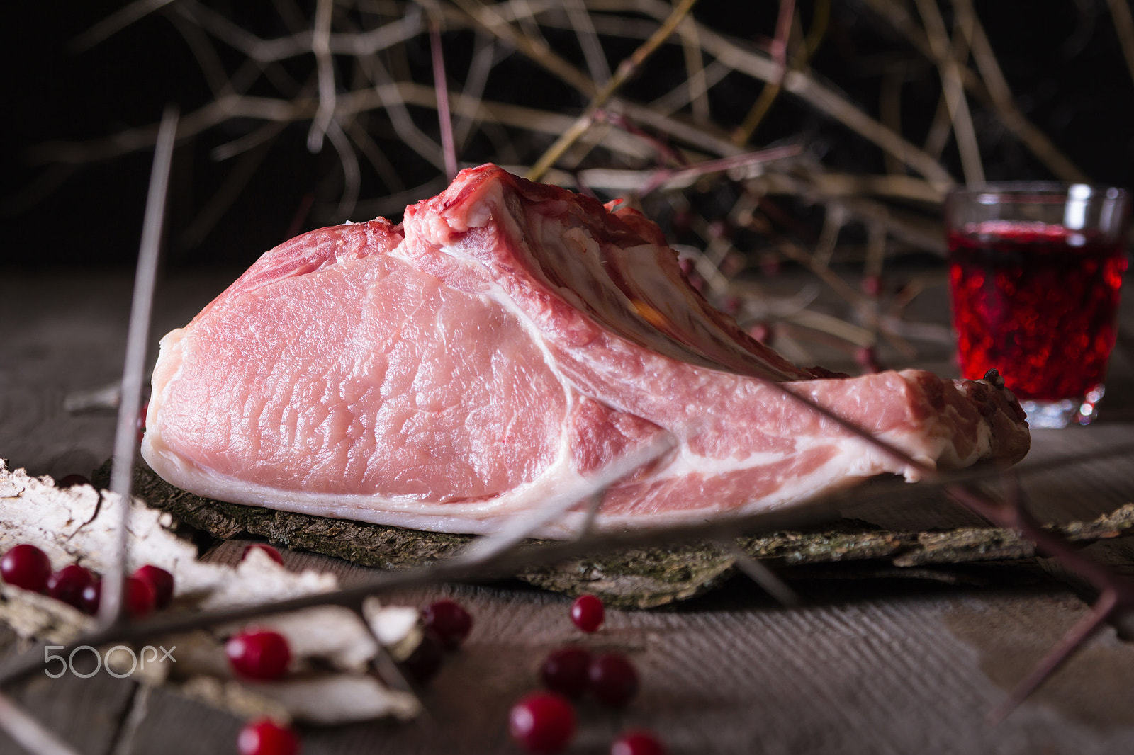 Canon EOS 60D sample photo. Fresh game meat on a wooden table photography