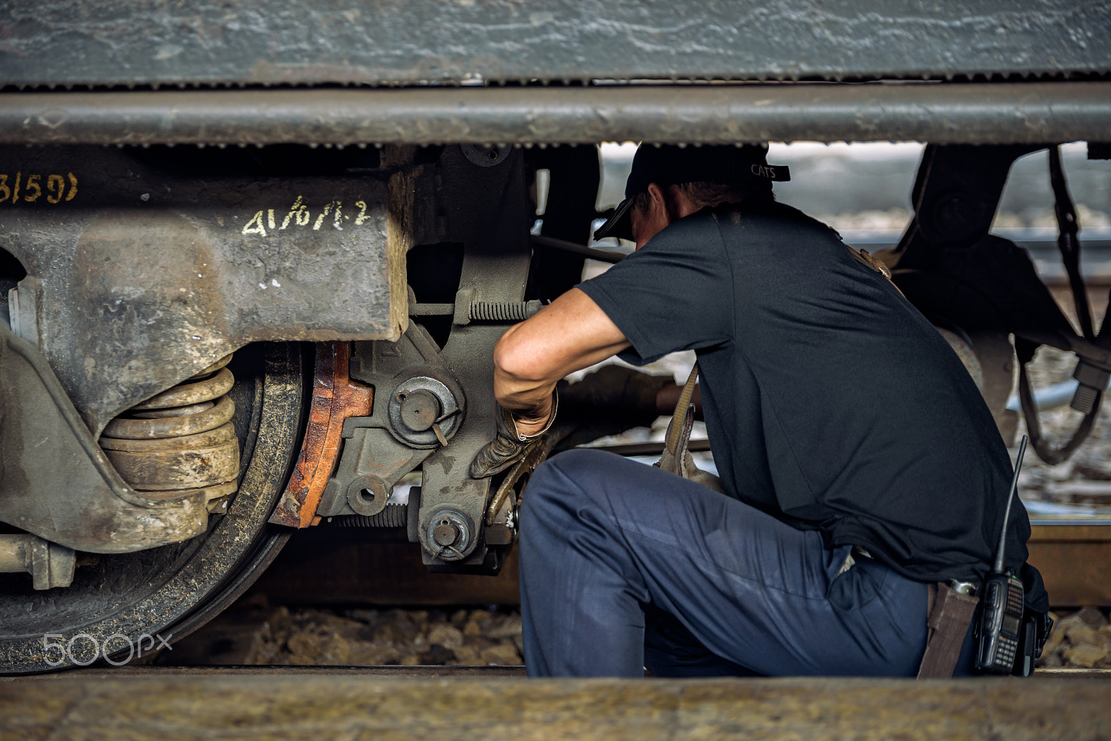 Nikon D750 + Tamron SP 70-200mm F2.8 Di VC USD sample photo. Mechanic stoop for adjust the wheel of train. photography