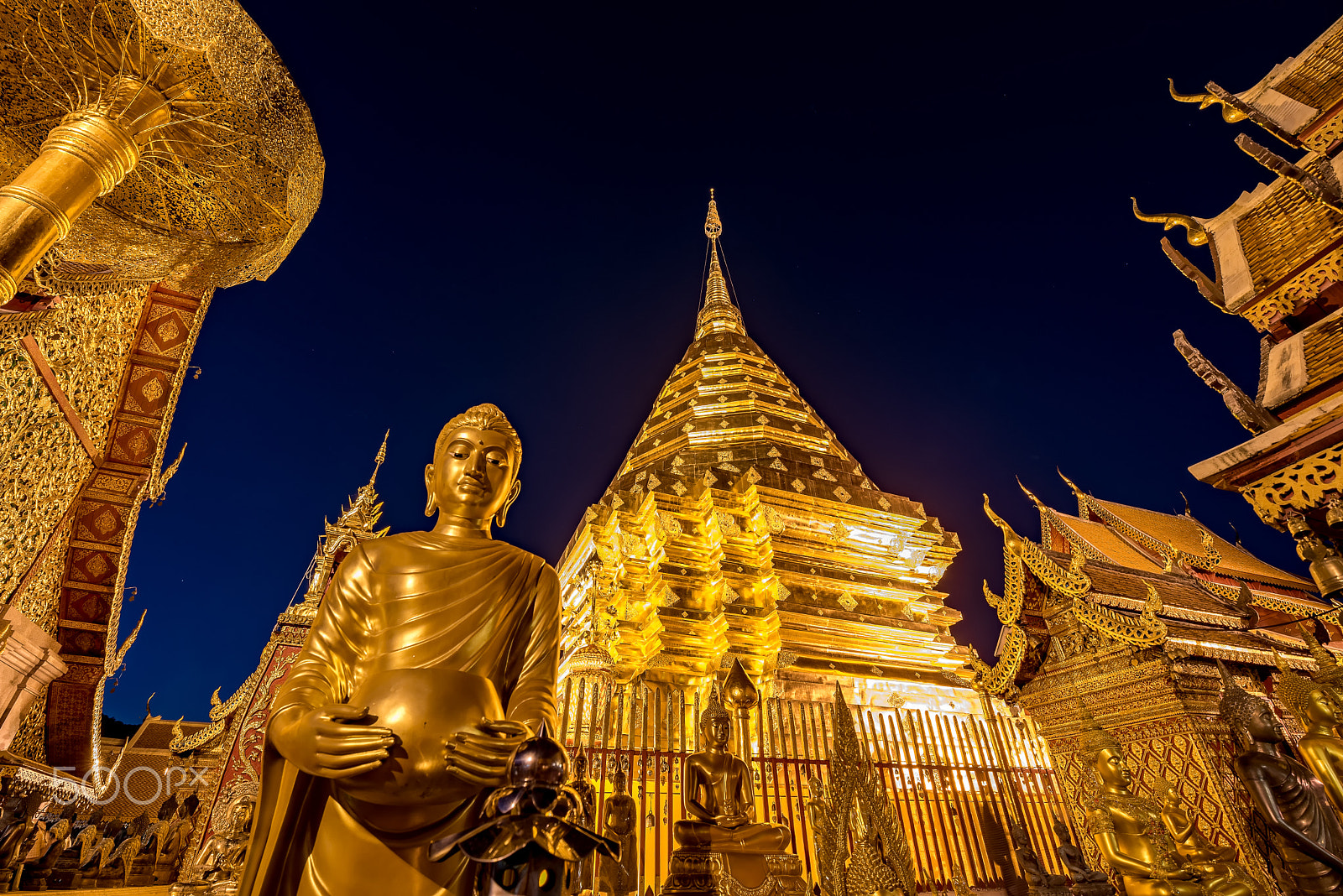 Nikon D750 + Tamron SP 15-30mm F2.8 Di VC USD sample photo. Gold pagoda and gold buddha statue with blue sky at wat phra tha photography