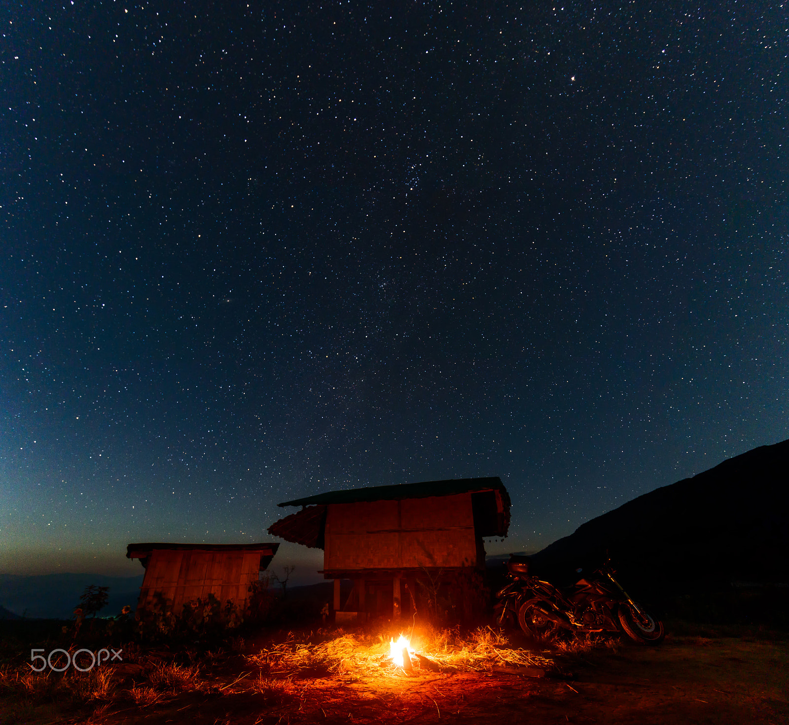 Tamron SP 15-30mm F2.8 Di VC USD sample photo. Campfire near the hut under the star in night sky. photography