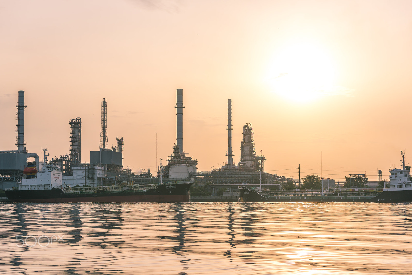 Tamron SP 70-200mm F2.8 Di VC USD sample photo. Ship are land to dock of oil refinery. photography
