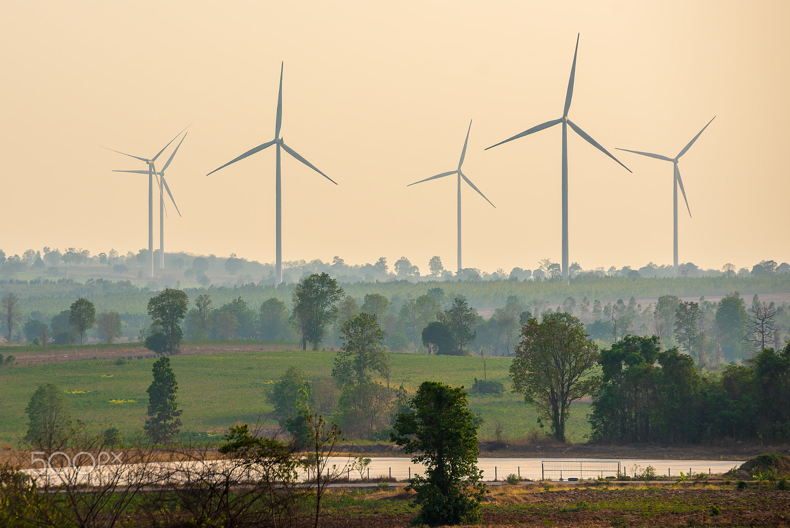 Nikon D750 + Tamron SP 70-200mm F2.8 Di VC USD sample photo. Group of wind turbines over the field. photography