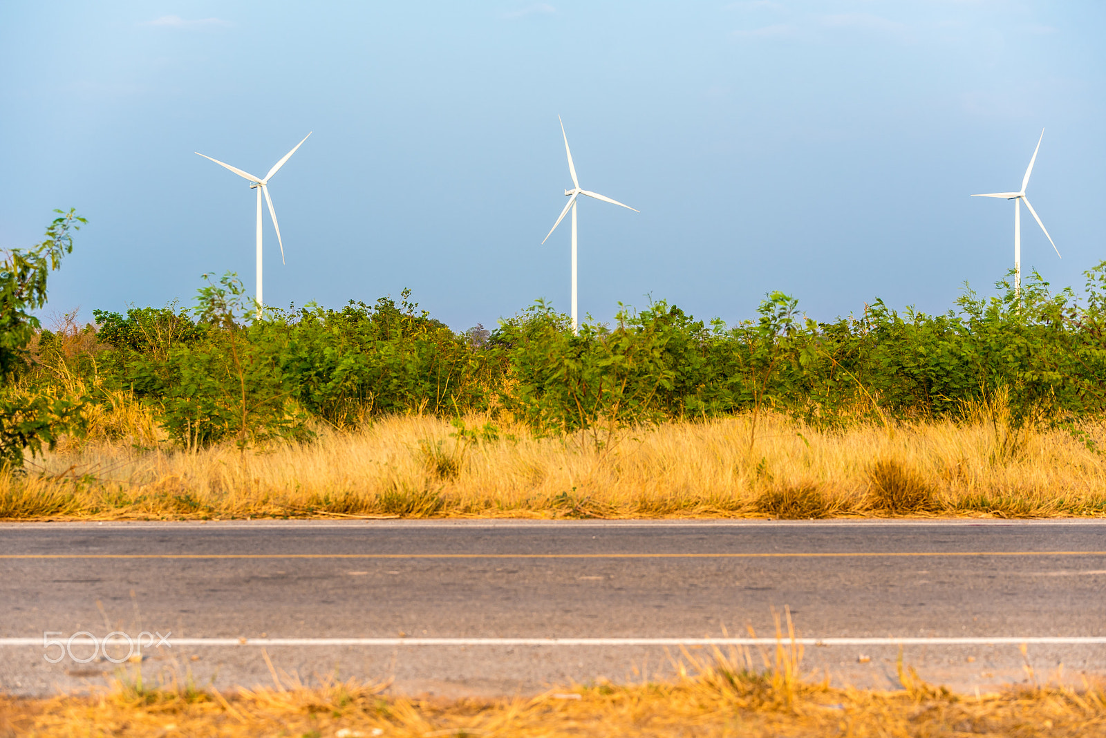 Tamron SP 70-200mm F2.8 Di VC USD sample photo. Wind turbines make green in the field that alone side the backco photography