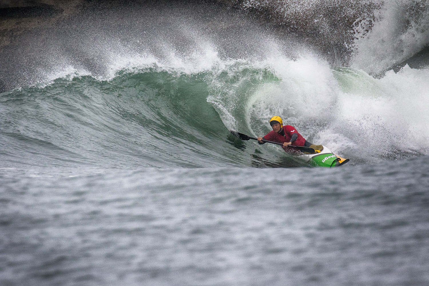 Canon EOS 7D Mark II + Canon EF 100-400mm F4.5-5.6L IS II USM sample photo. Shooting the curl in a kayak photography