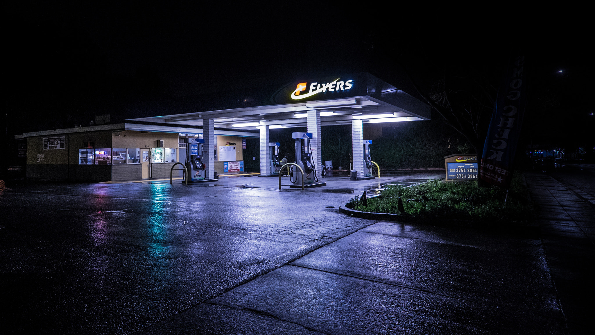 ZEISS Touit 12mm F2.8 sample photo. Gas station - mountain view photography