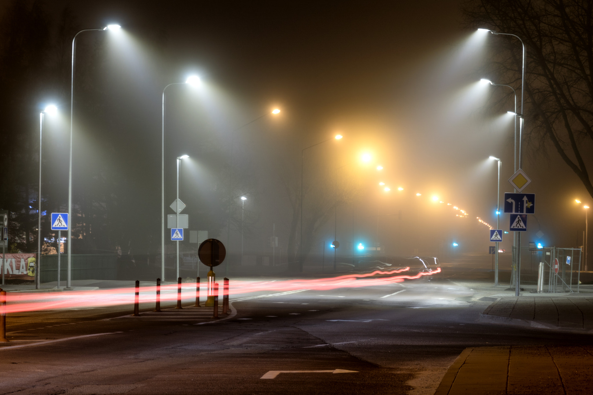 Sony DT 18-200mm F3.5-6.3 sample photo. Fog in the town photography