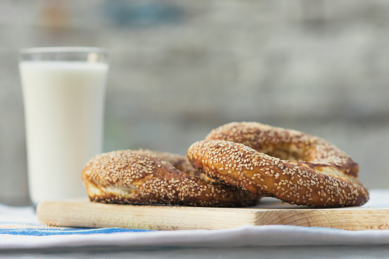 Nikon D3200 sample photo. Fresh baked bagel  and a glass of yogurt. photography