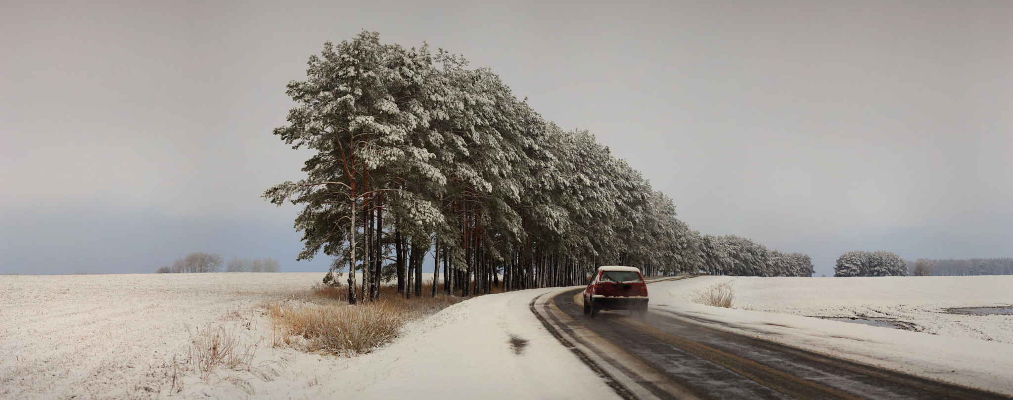 Canon EF 100mm F2.8 Macro USM sample photo. Traffic on the road in bad weather conditions in winter photography