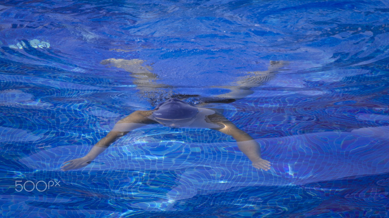 Nikon AF-S Nikkor 200-500mm F5.6E ED VR sample photo. Swimmer in a pool in indiadsc photography
