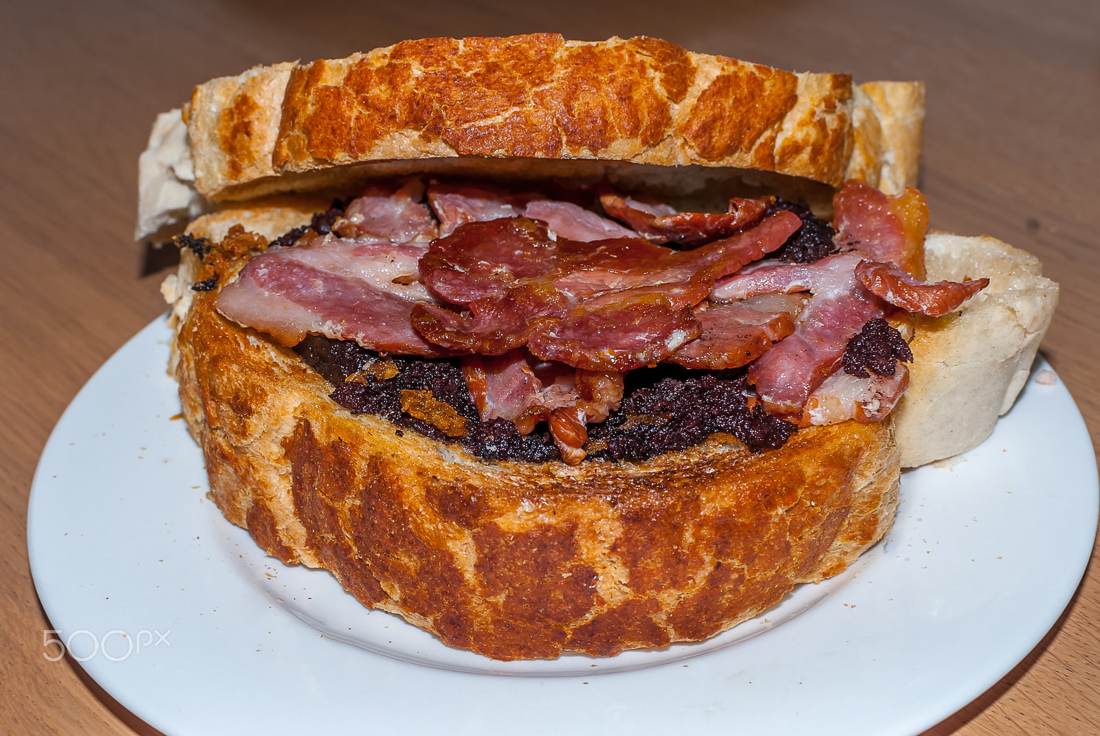 Nikon D200 + Nikon AF-S DX Nikkor 35mm F1.8G sample photo. Toasted_bacon_and_black_pudding_sandwich.jpg photography