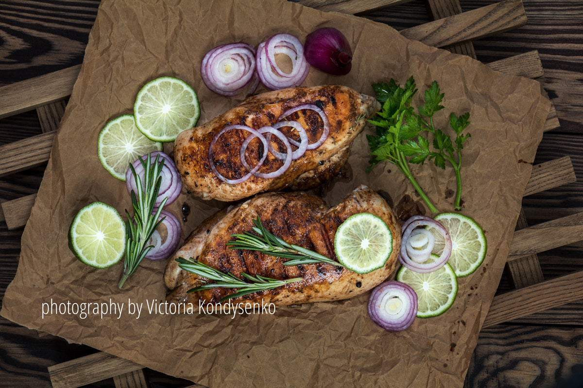 Canon EOS 80D sample photo. Grilled chicken filet with herbs  on a paper photography