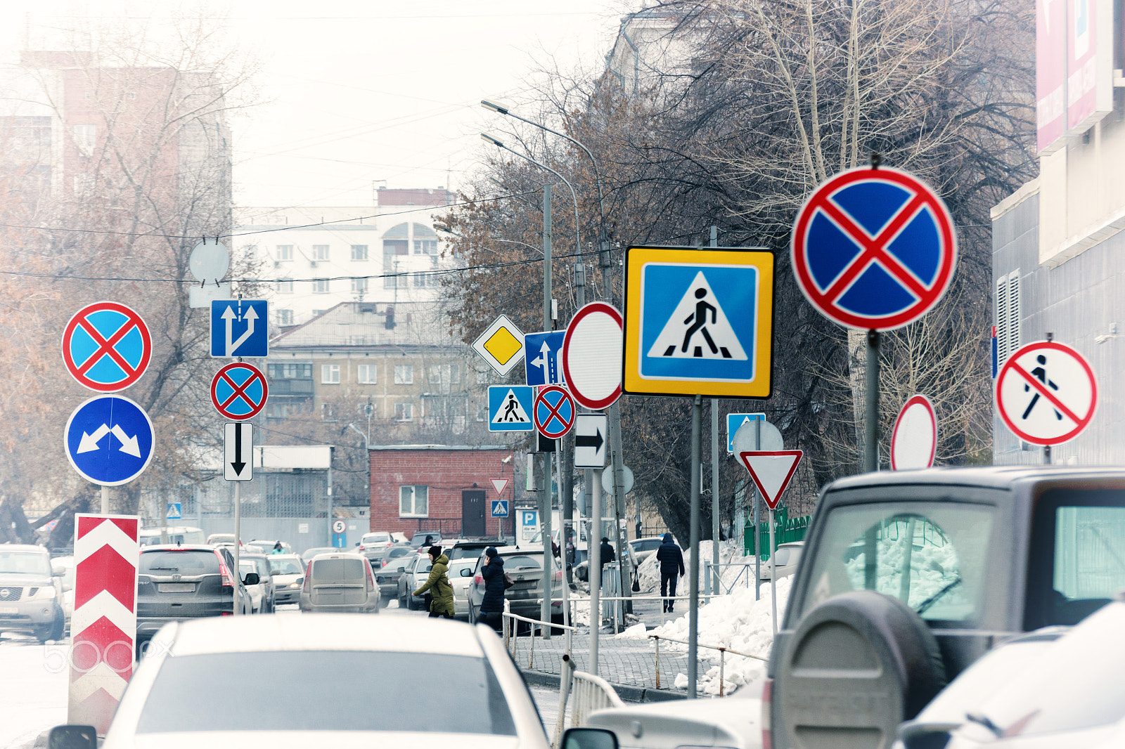 Canon EOS 750D (EOS Rebel T6i / EOS Kiss X8i) + Tamron SP 35mm F1.8 Di VC USD sample photo. Cluster of road signs photography