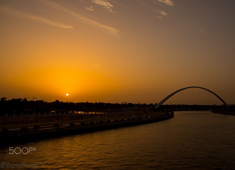 Canon EOS 650D (EOS Rebel T4i / EOS Kiss X6i) + Sigma 18-250mm F3.5-6.3 DC OS HSM sample photo. Sunset by the canal....(dubai canal) photography