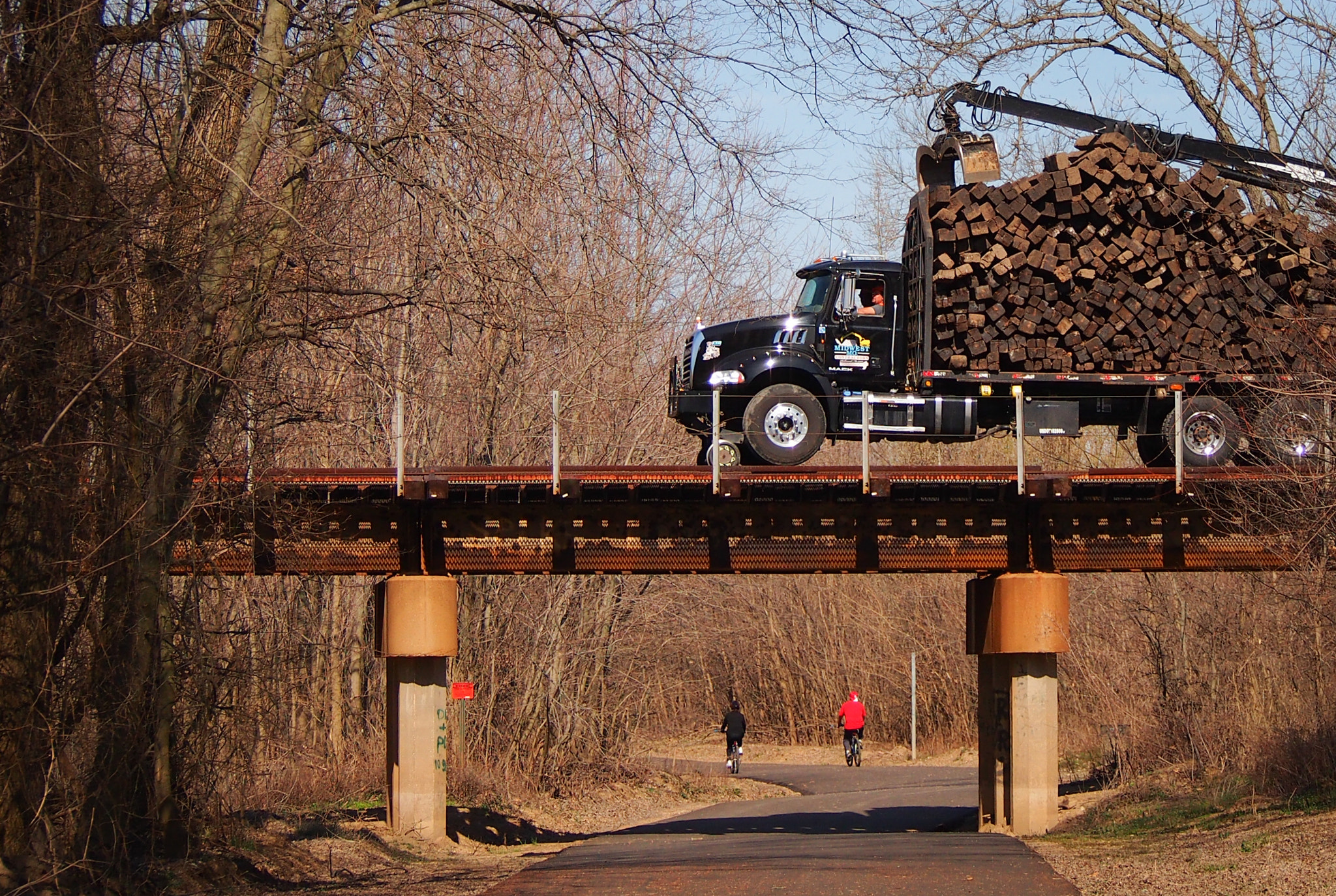 Olympus OM-D E-M5 sample photo. Railroad work and bicycles photography