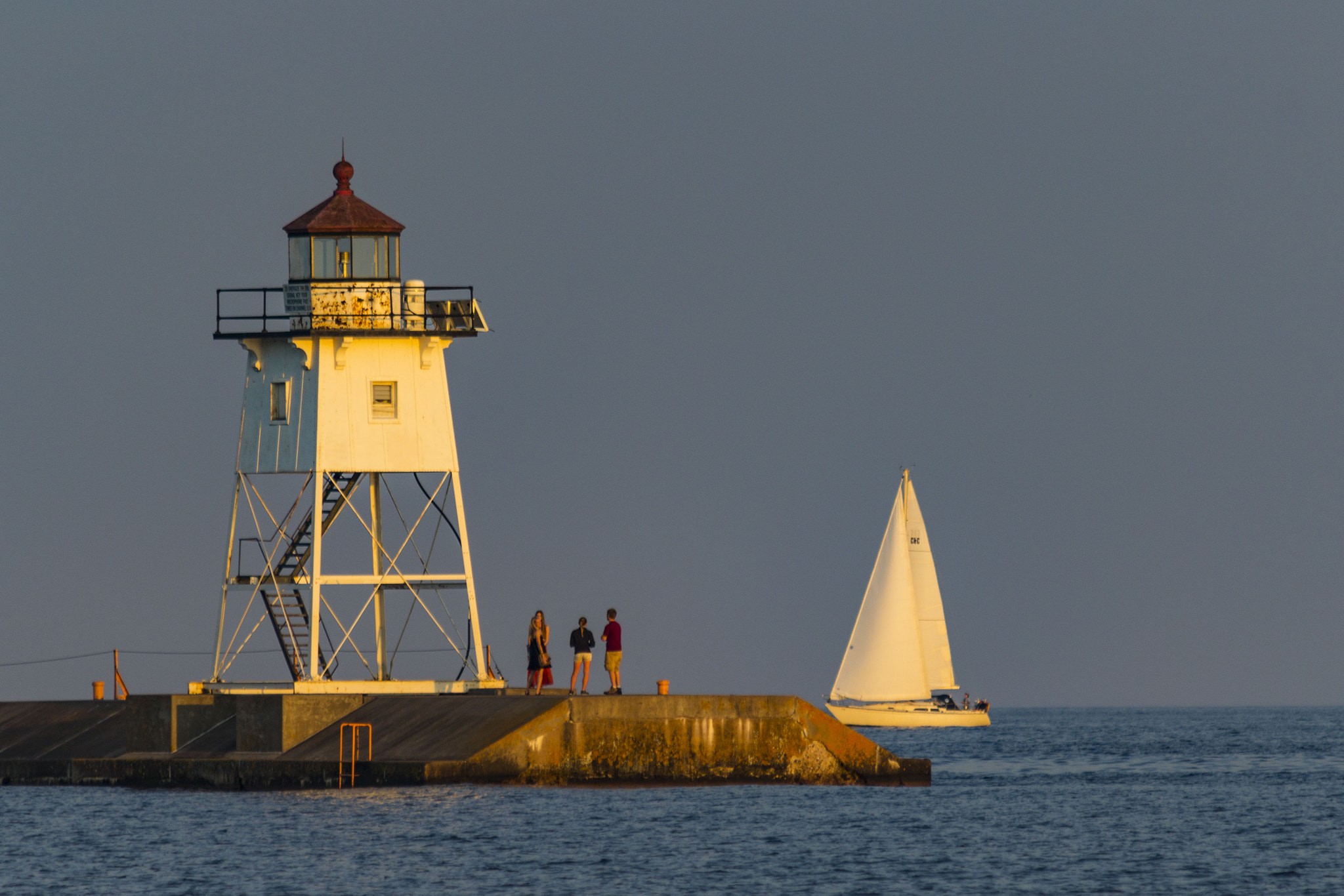 Canon EF 70-300mm F4-5.6 IS USM sample photo. Grand marais lighthouse at sunset photography