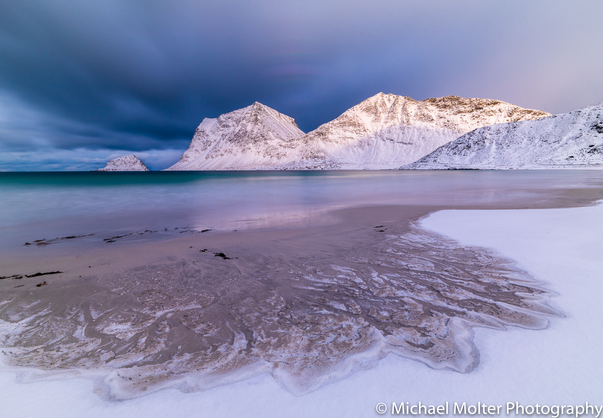 HCD 24 sample photo. Sunrise and snow storm over haukland beach photography