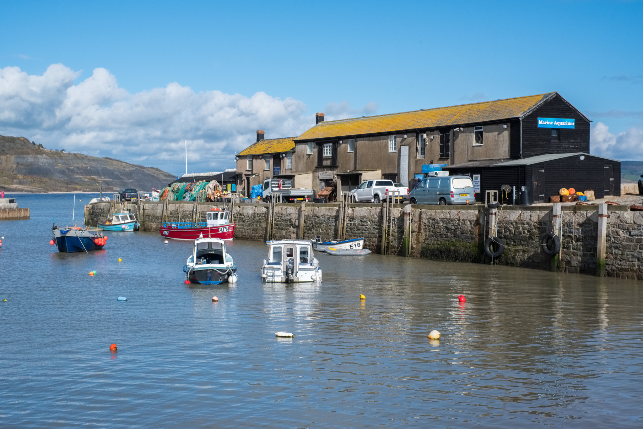 Fujifilm X-T2 + Fujifilm XF 35mm F1.4 R sample photo. Boats in the harbour at lyme regis photography